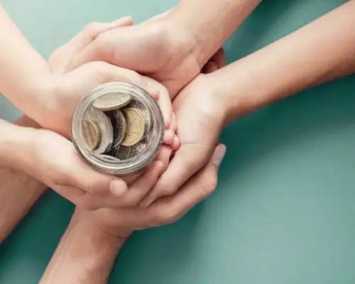 child and parent hands holding money jar, donation, saving, charity, family finance plan concept, Coronavirus economic stimulus rescue package, superannuation concept
